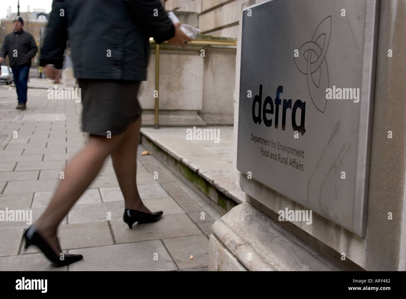 DEFRA department for environment food and rural affairs signage with pedestrians Stock Photo