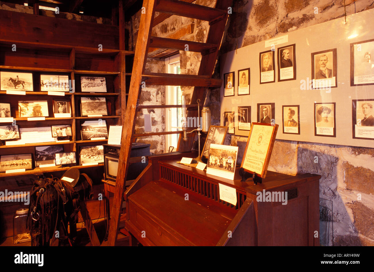 Displays of historical photographs and artifacts within the Greenwell Store, museum of the Kona Historical Society, Big Island Stock Photo