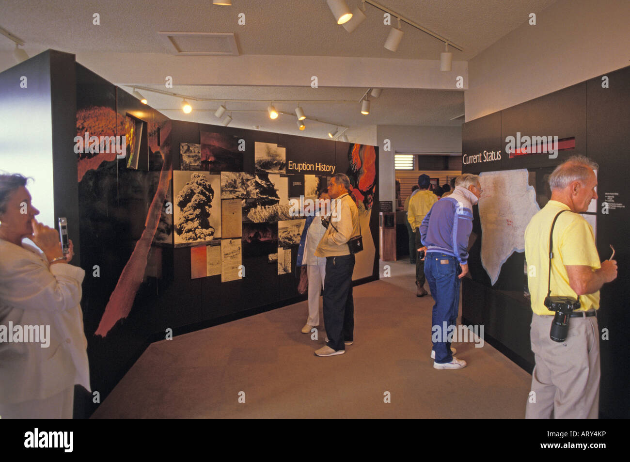 Tourists view the exhibits at the Thomas A. Jager Museum at Halemaumau Crater within the Hawaii Volcanoes National Park on the Stock Photo