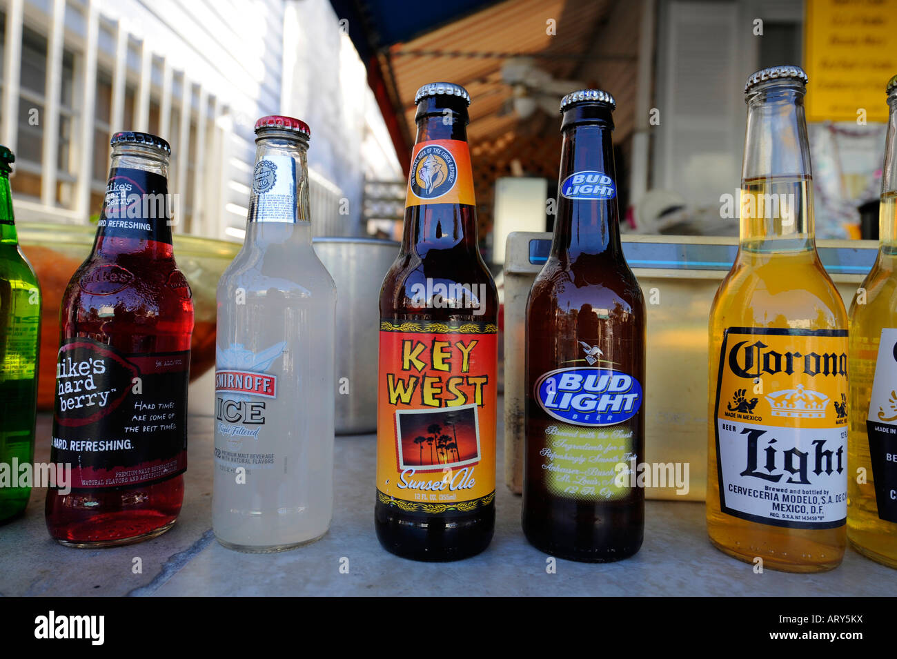 Key West Florida Bottles of Beer lined up on open air outside bar Stock