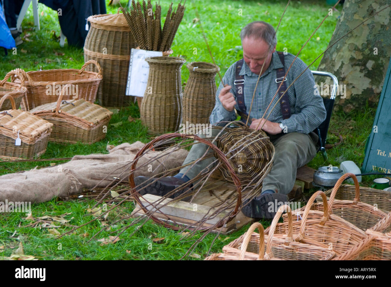 Basket weaver making a basket Stock Photo