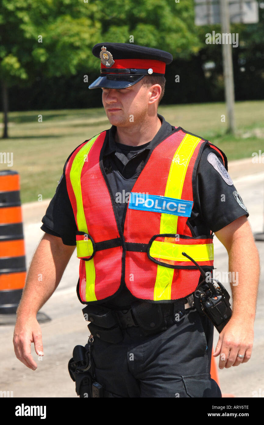 Canadian Police Officer on Traffic Duty wearing a high-visibility vest  Stock Photo - Alamy