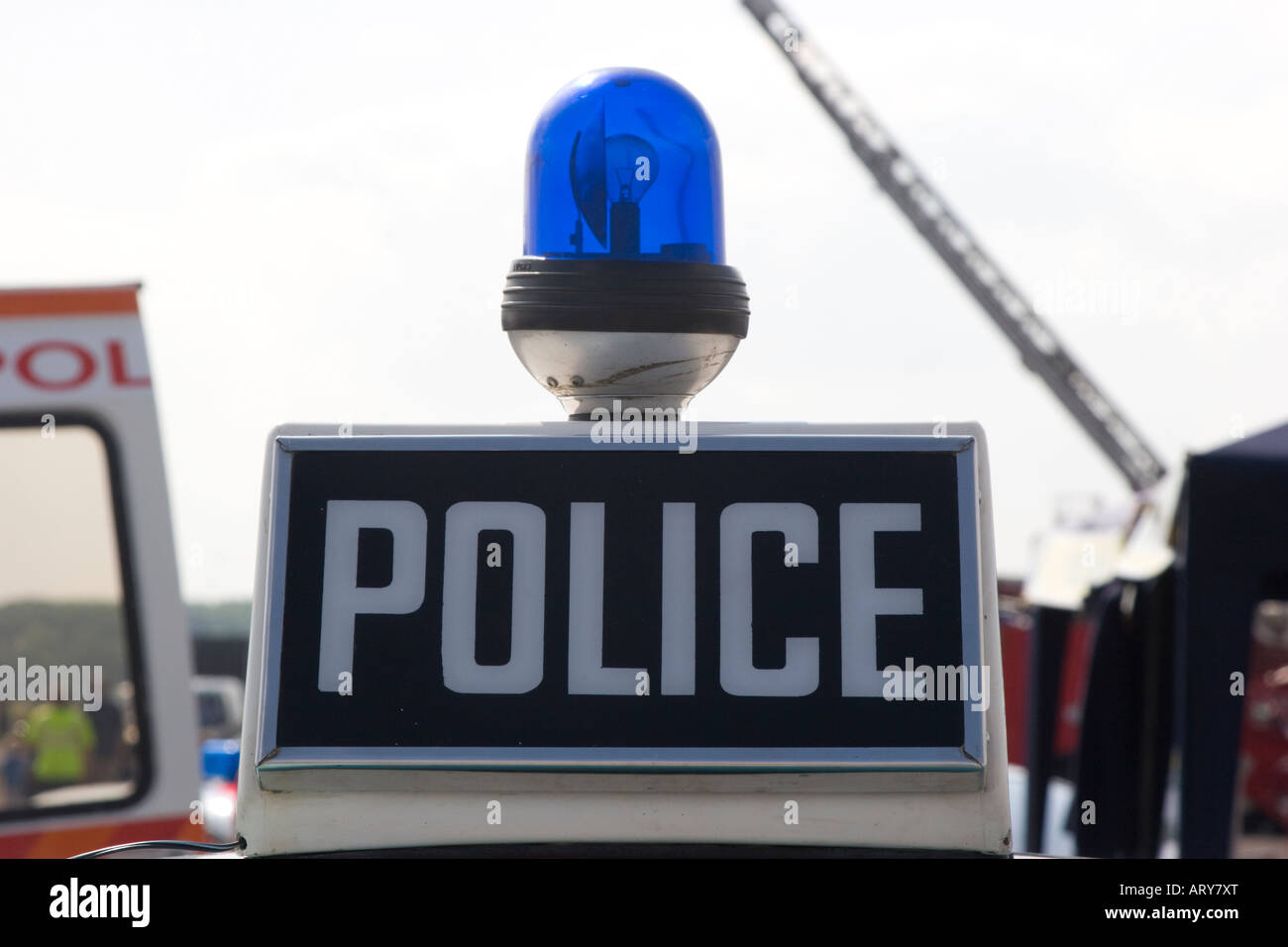 Emergency blue lights mounted on the roof of an emergency service