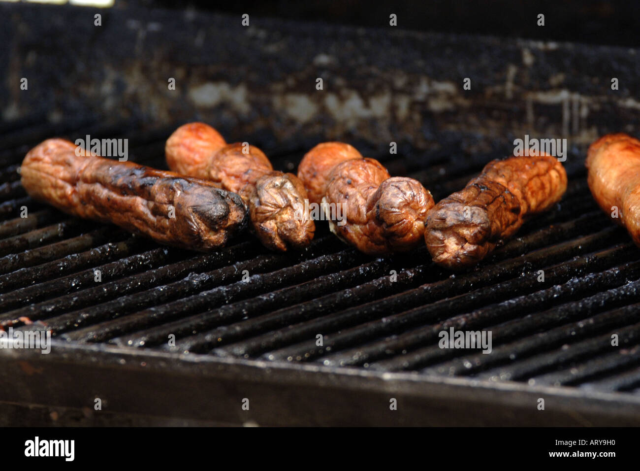 BBQ Sausages of a rack just waiting to be eaten Stock Photo Alamy