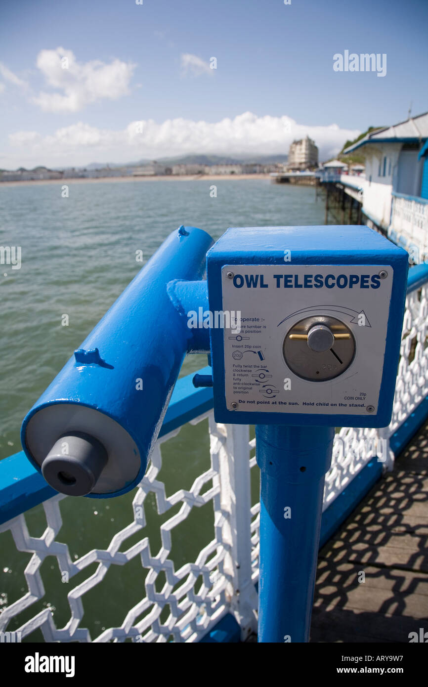 Coin operated telescope at end of pier Llandudno Wales UK Stock Photo