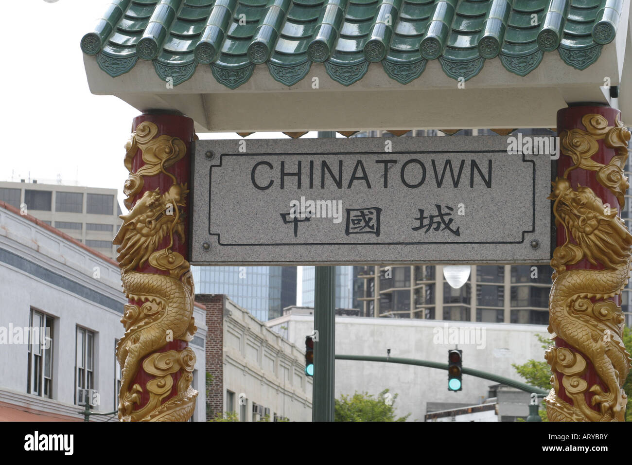 Marble sign written in both english and chinese welcomes all visitors to scenic and historic Chinatown area of downtown Honolulu Stock Photo