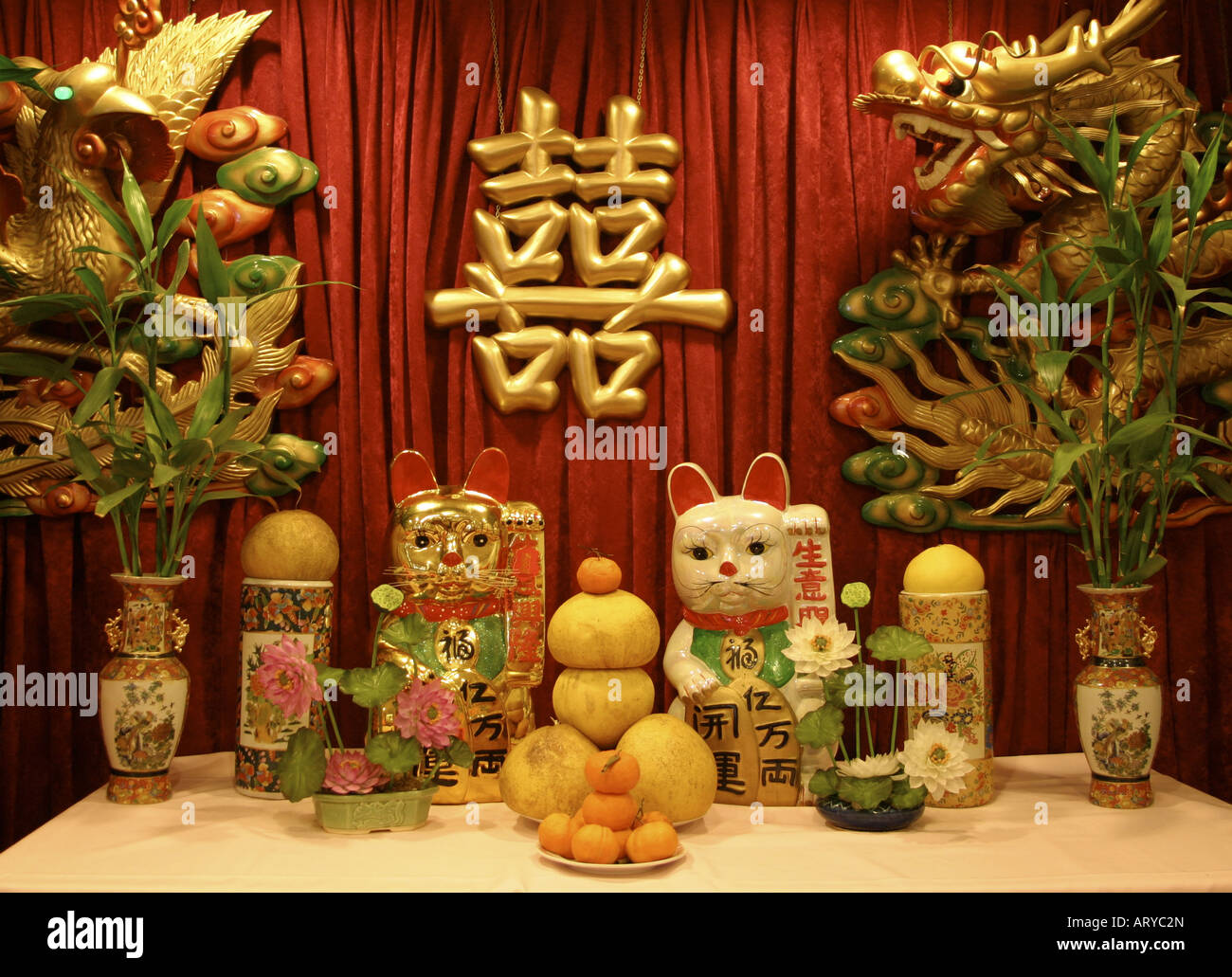 Ceramic Cats Dragons Vases And Fresh Fruits Signify Prosperity