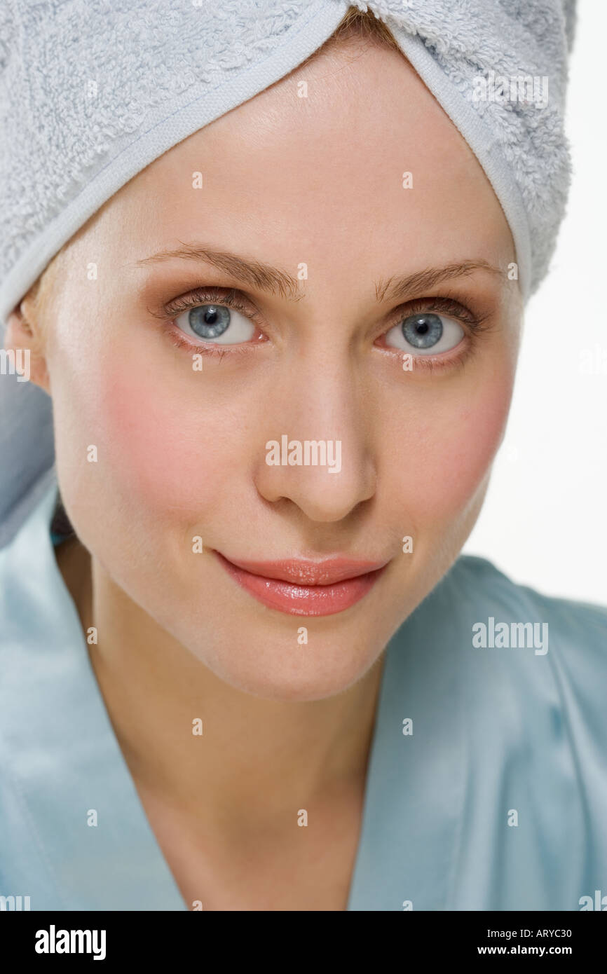 Smiling woman with towel on head Stock Photo