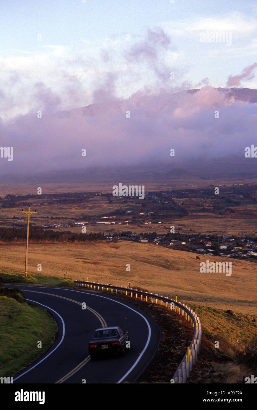 Car on rode leading to Waimea town, North Kohala, Big island of Hawaii