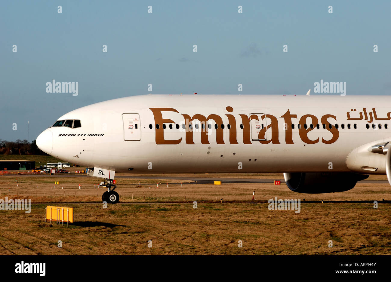 Emirates Airlines Boeing 777 aircraft taxiing at Birmingham Interntional Airport, England, UK Stock Photo
