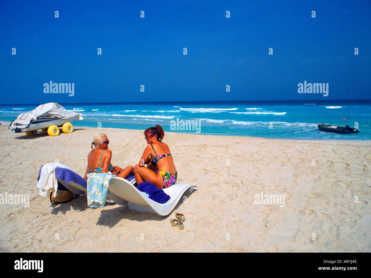 Dubai UAE Chicago Beach, Hotel Beach Sunbeds Sunbathers Stock Photo