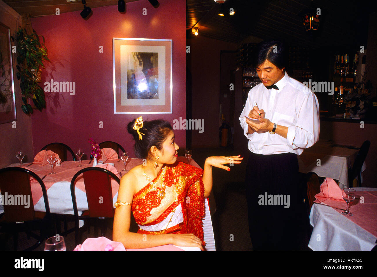 Restaurant Interior Thai Woman Ordering Meal Stock Photo