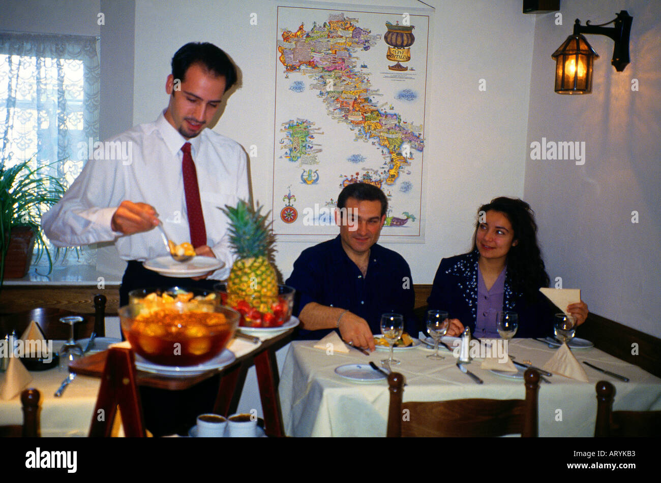 Italian Restaurant Interior Waiter Serving Dessert Stock Photo