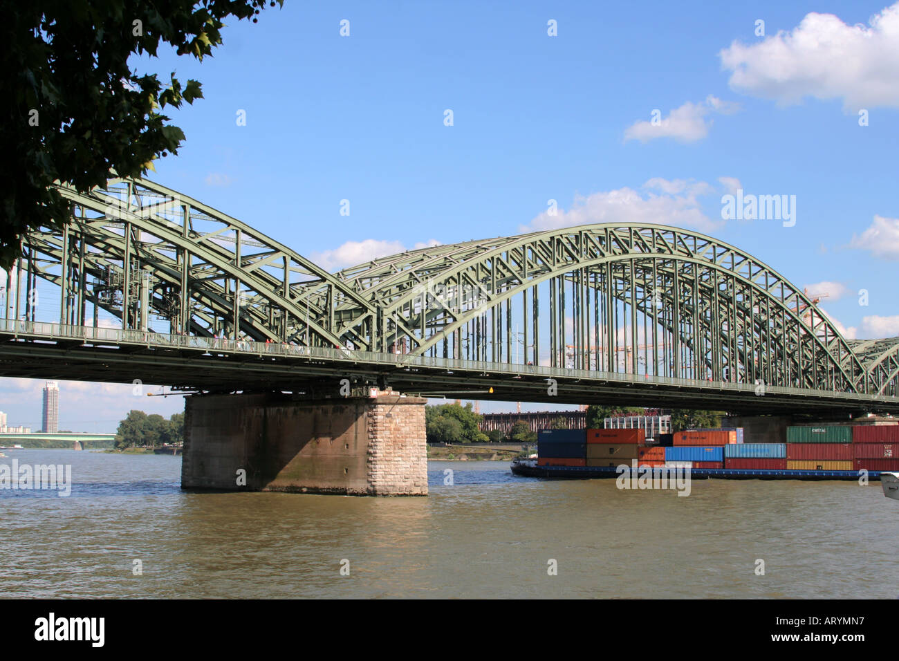 Hohenzollern Bridge and container ship Cologne North Rhine Westphalia Germany Stock Photo