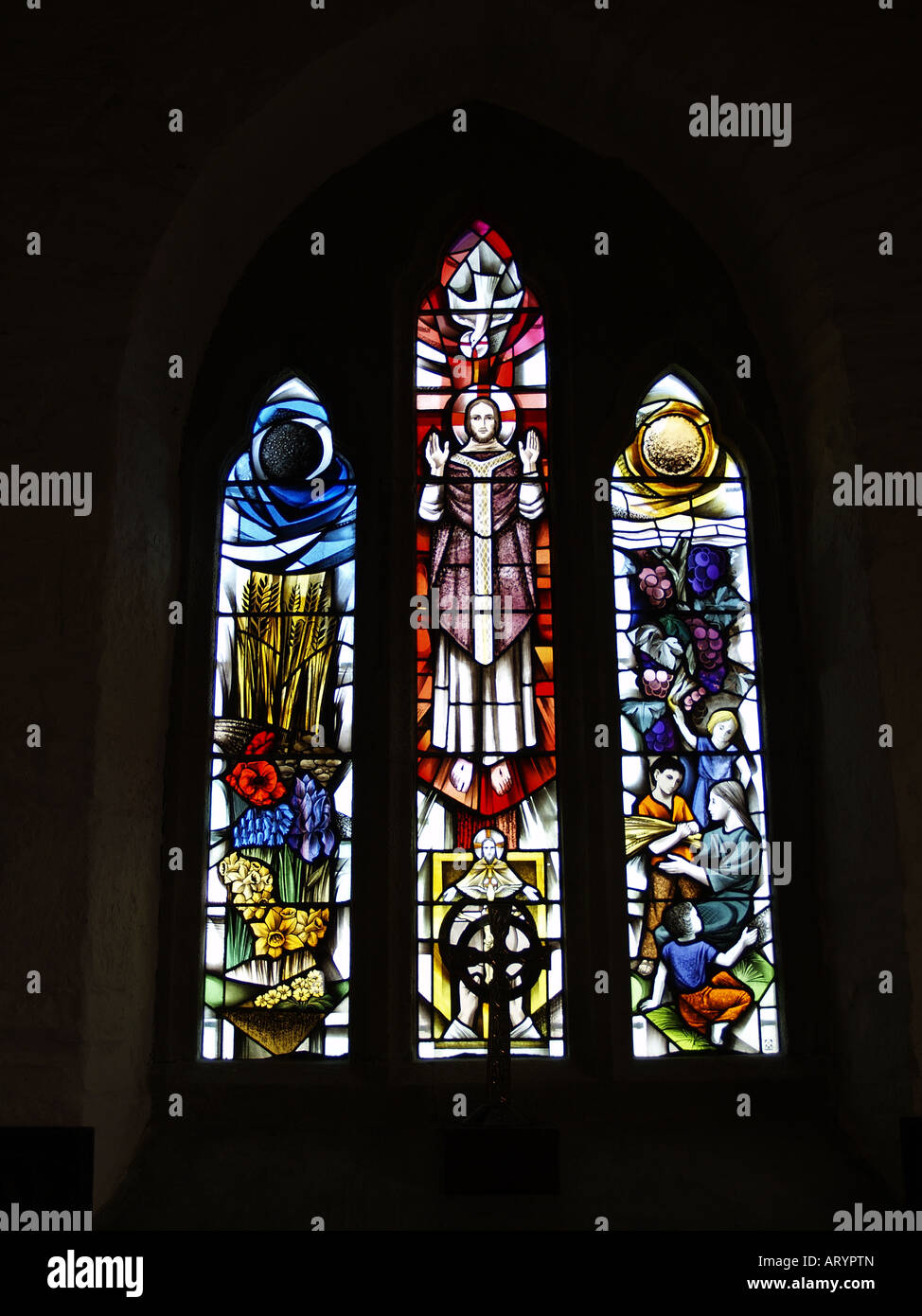 Stained glass window at St Materiana's church, Tintagel, Cornwall, UK