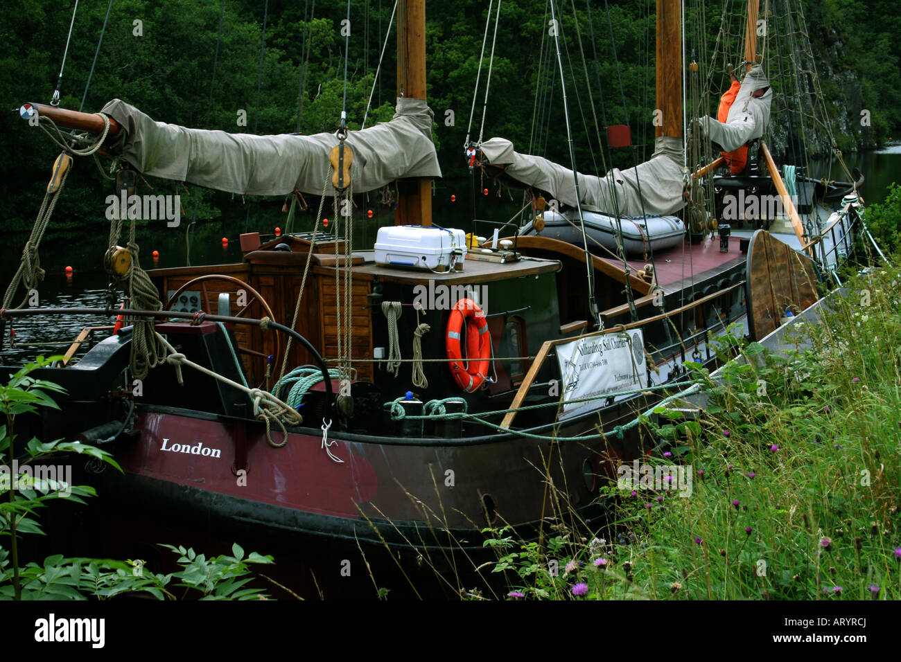 A Barge Moored in the Crinan Canal Stock Photo