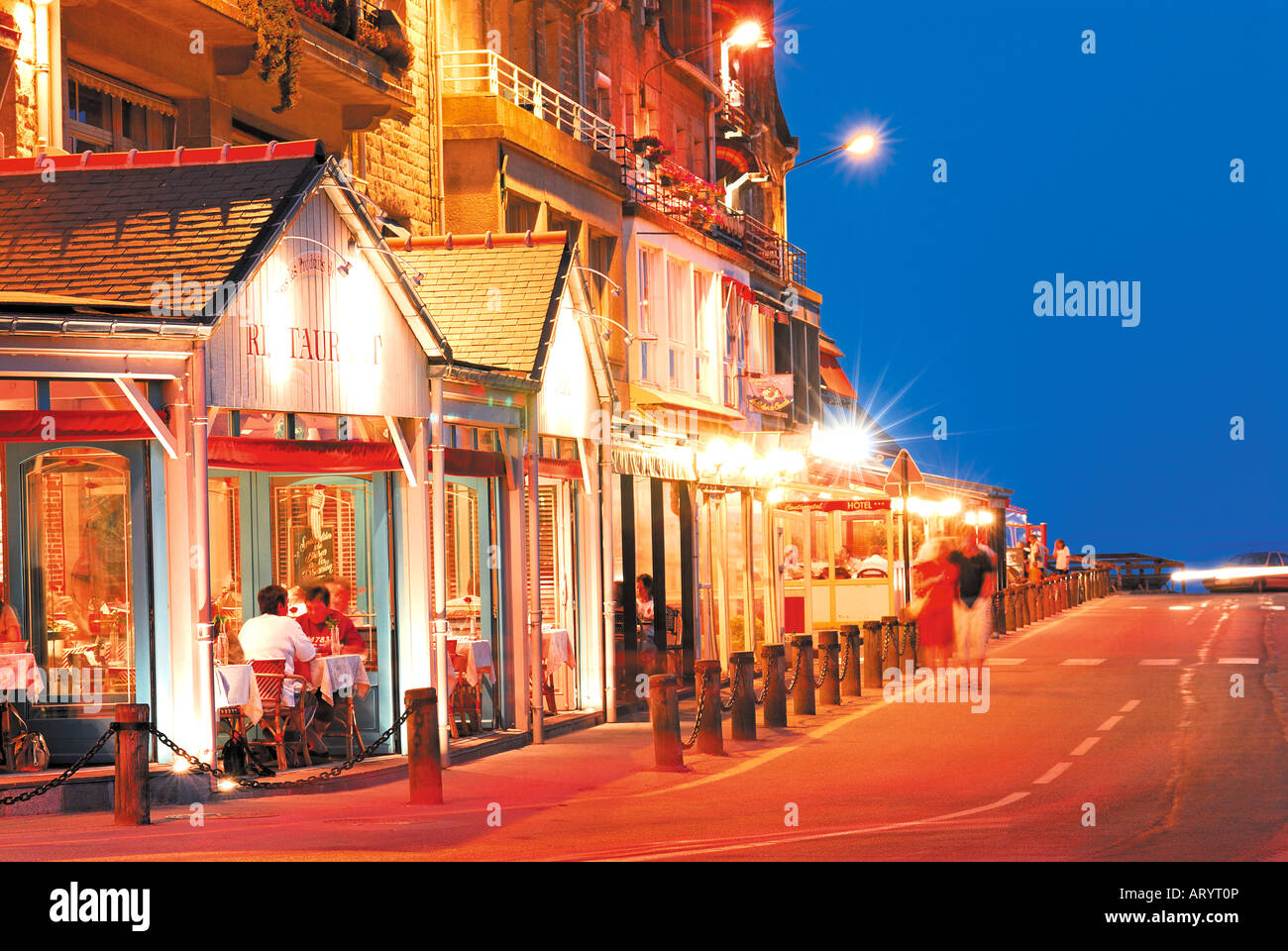 Nightly iluminated Restaurant mall in oyster capital Cancale, Brittany, France Stock Photo