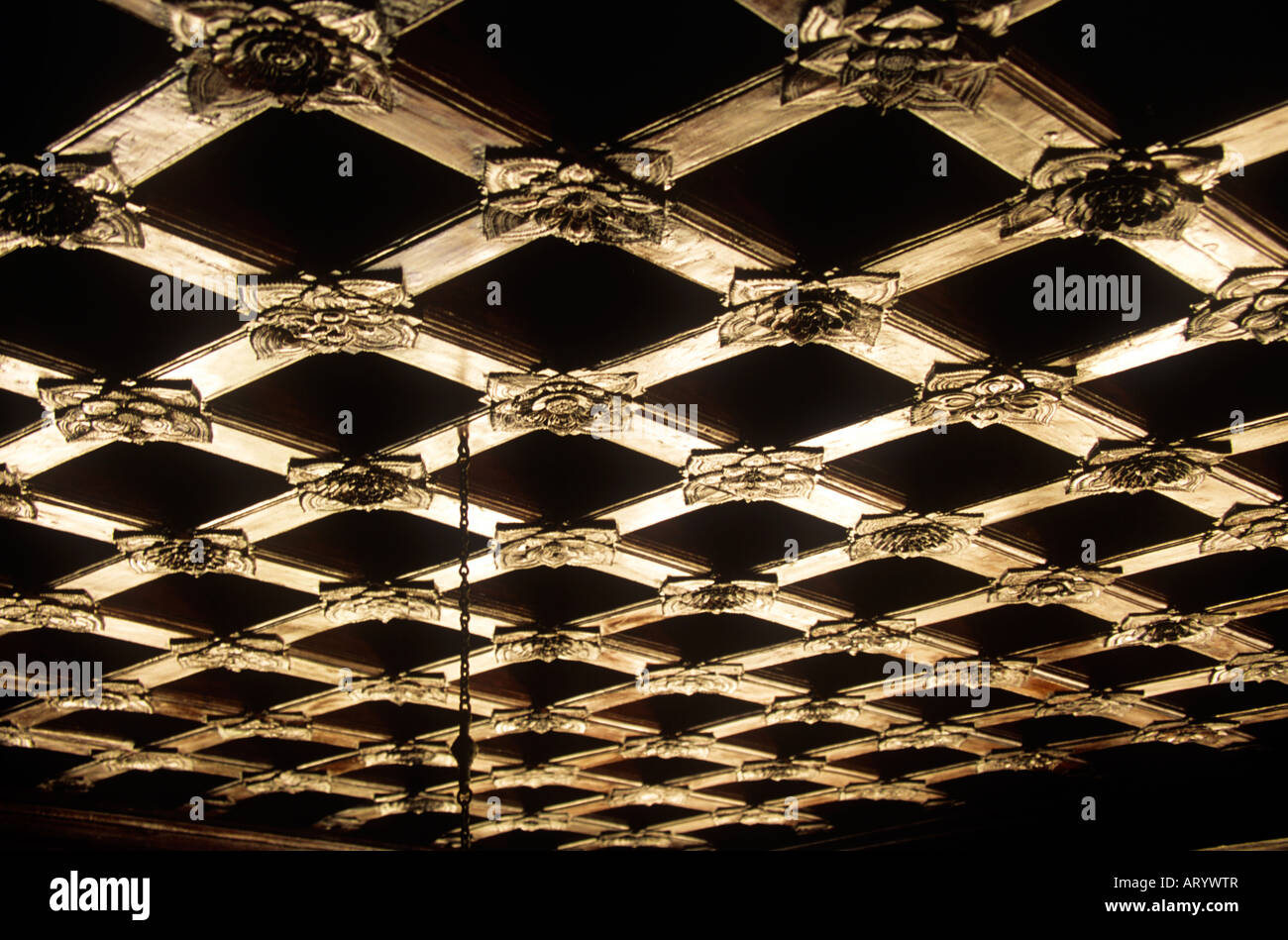 Ornate carved ceiling in Kuthiramalika Palace ,Kerala which is now a museum open to the public Stock Photo