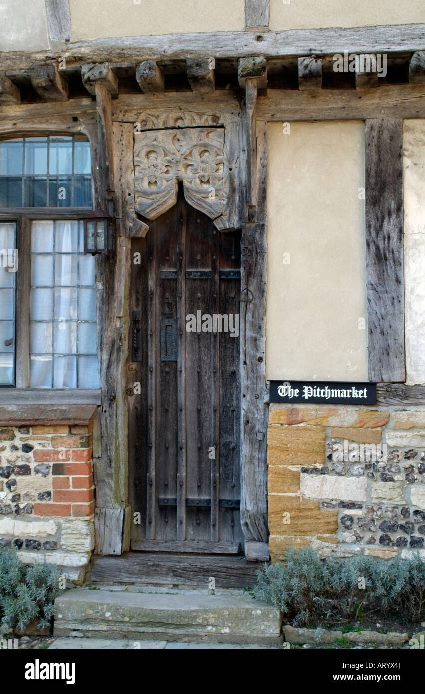 16th Century Pitchmarket Historic House Door in Cerne Abbas Dorset England Grade 1 Listed Building dating from Tudor times Stock Photo