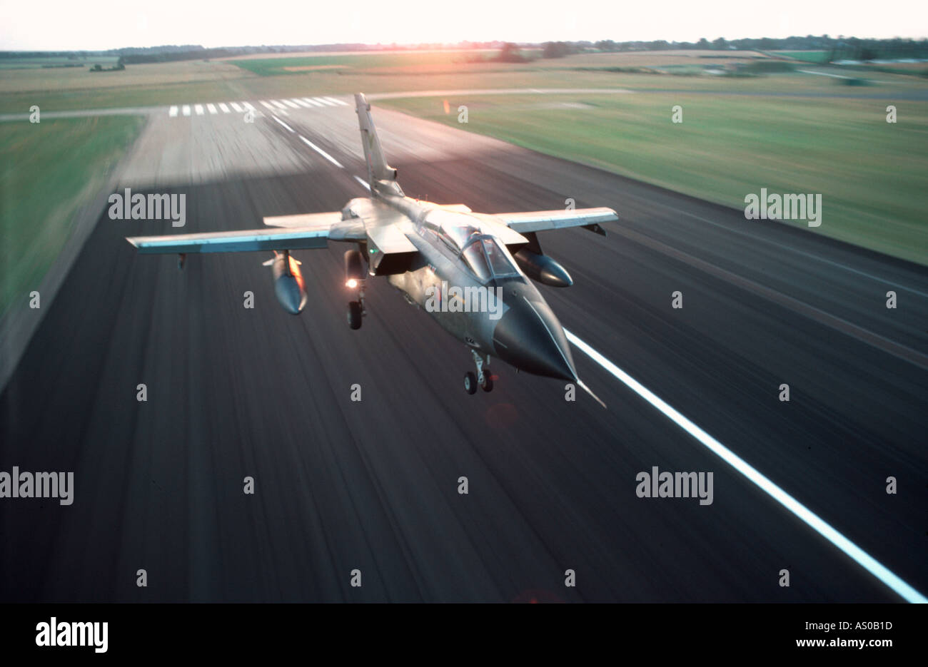 Tornado GR1 jet aircraft landing on runway Stock Photo
