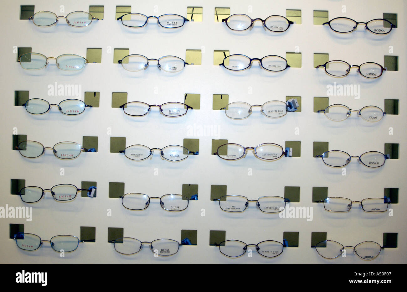 Designer spectacle frames on display in an optician s store Stock Photo