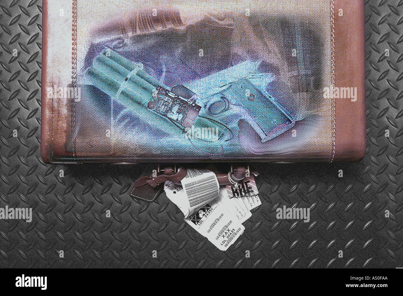 suitcase with bomb and gun x rayed for security Stock Photo Alamy