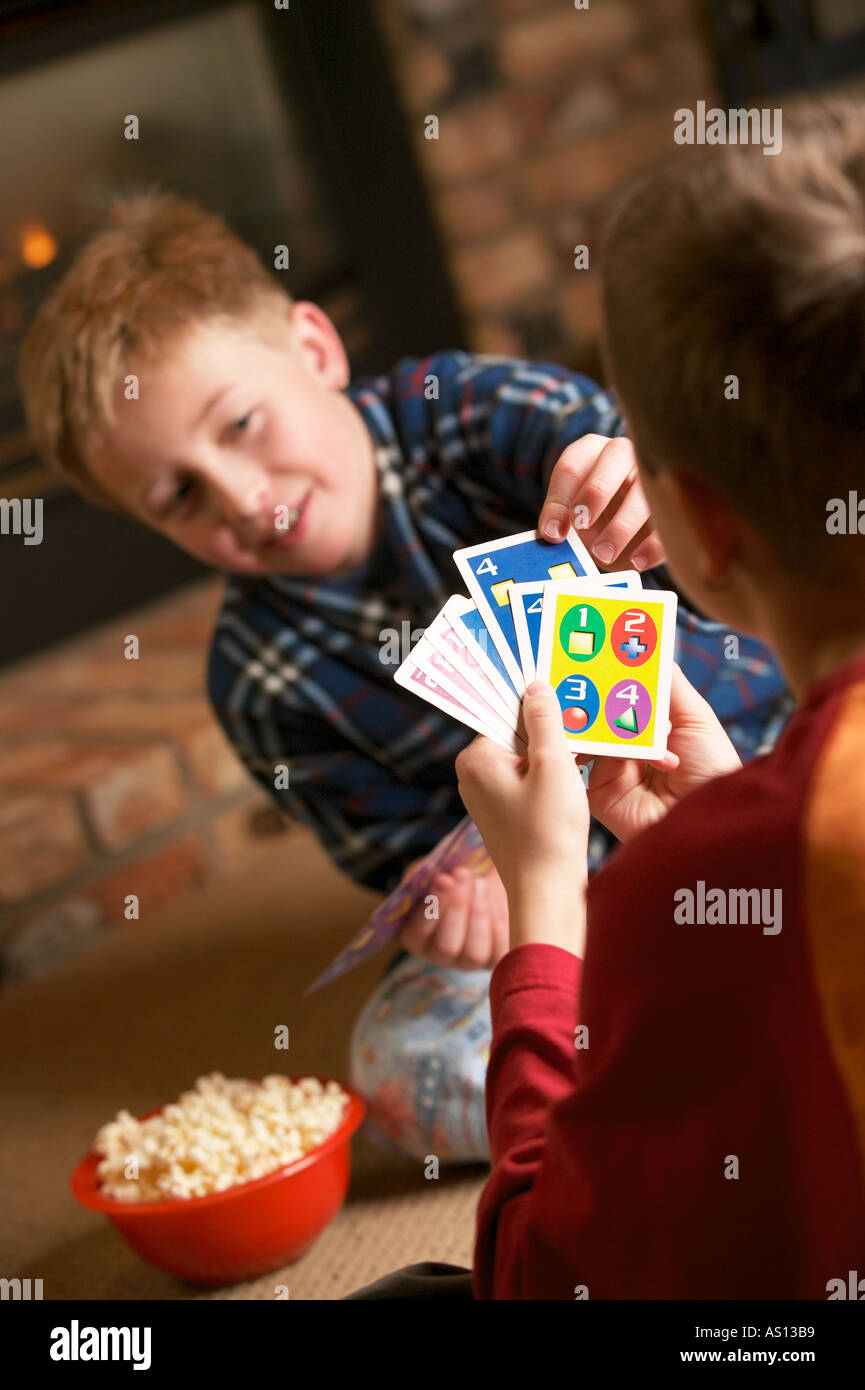 Two boys playing cards Stock Photo Alamy
