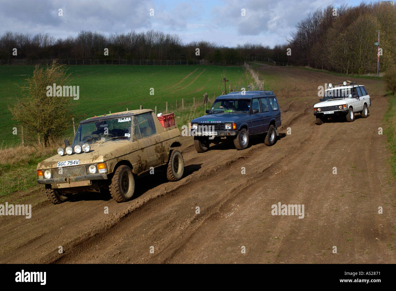 Members of the Green Lane Association driving Land Rovers on The ...