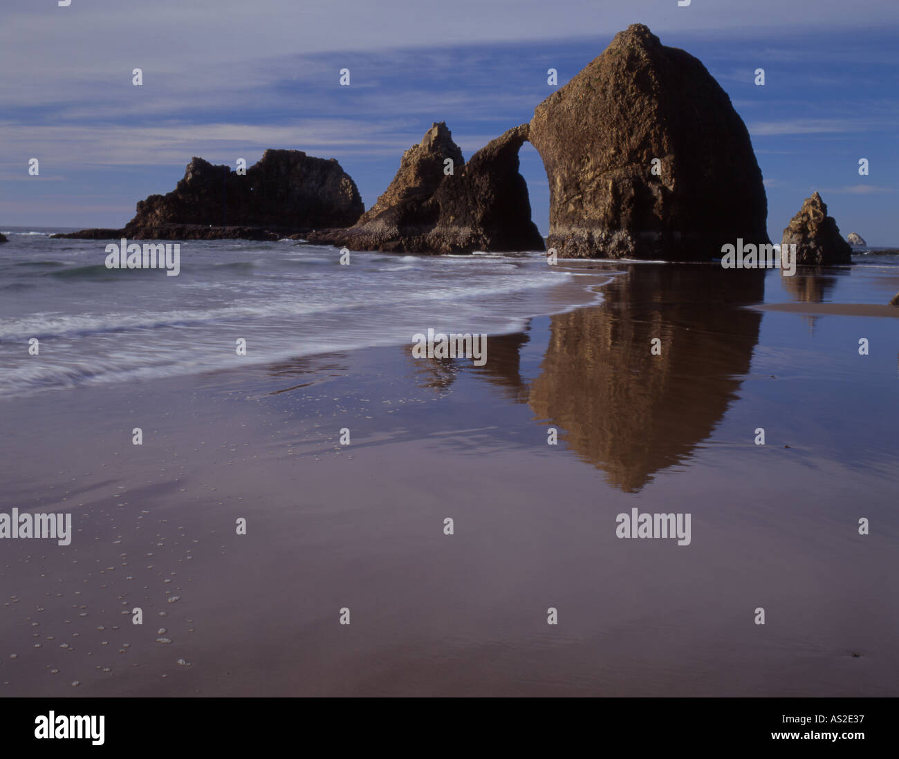 Oregon s Oceanside Arch and the Pacific Ocean Stock Photo