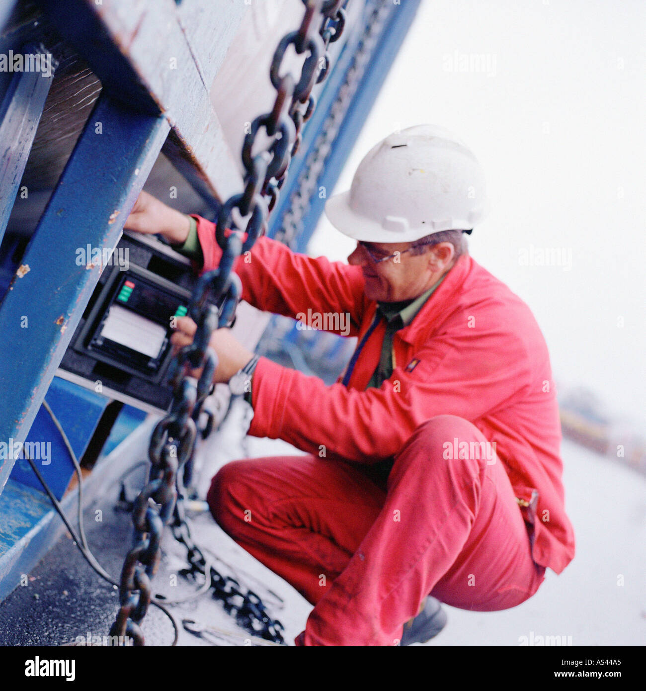 Engineer working on machine Stock Photo