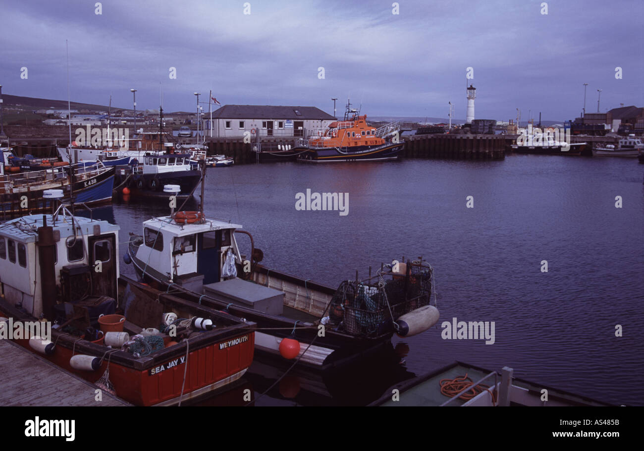 Boats moored at Kirkwall harbour Orkney Islands Scotland Stock Photo