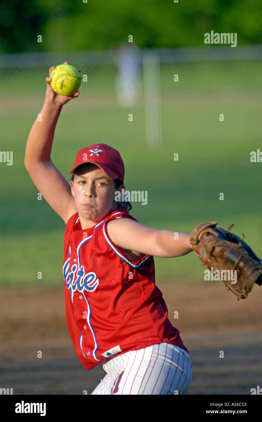 Young girl pitching and learning in real Fast Pitch Softball practice