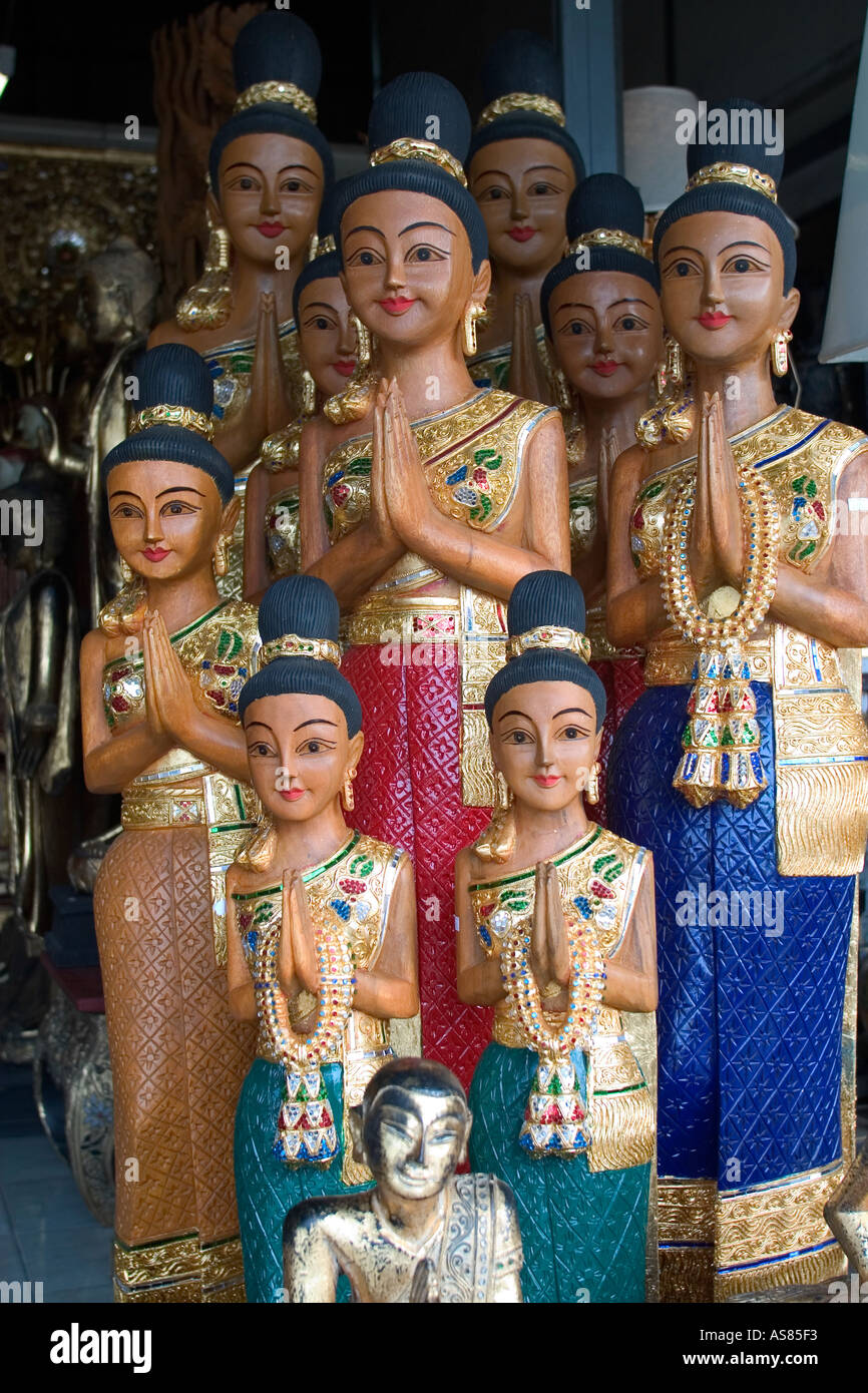 Carved Wood Figures on sale at Chatuchak Market Bangkok Thailand Stock