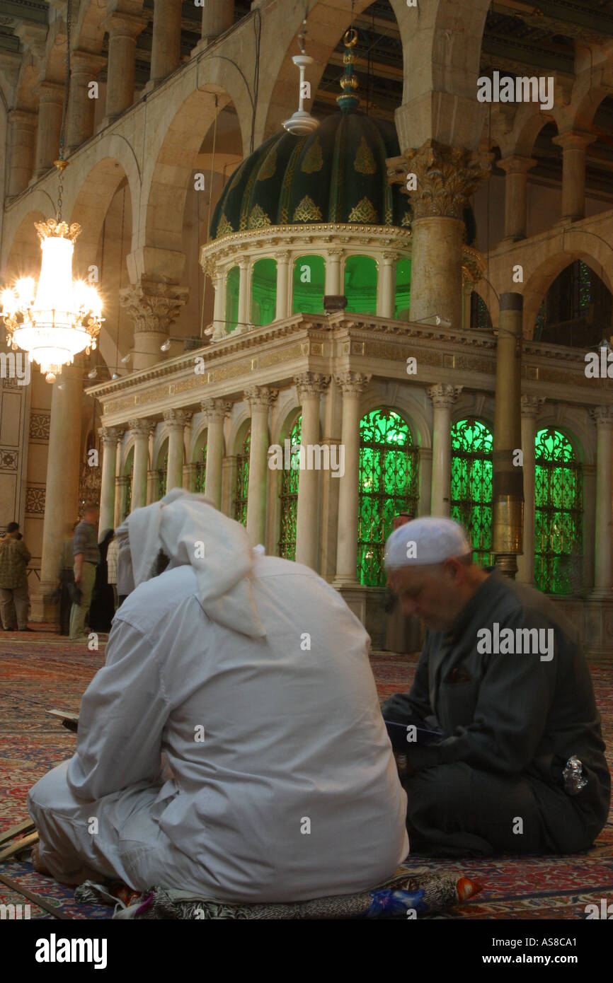 Praying inside the Umayyad mosque Stock Photo