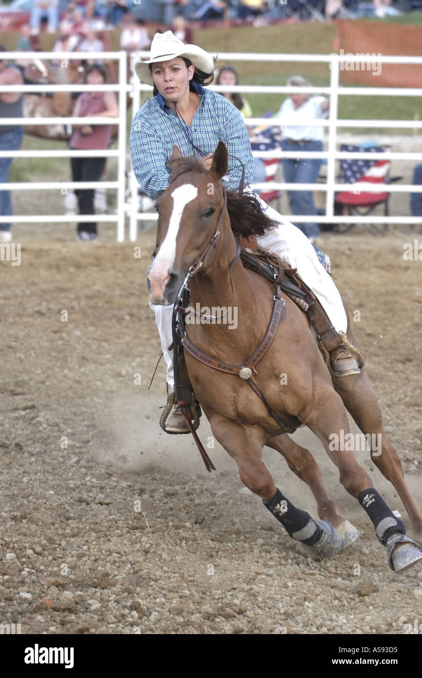 Females Compete in Rodeo Barrel Competition Stock Photo