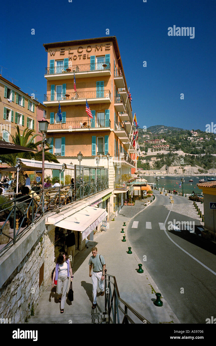 Villefranche sur mer Cote dAzur France- The Welcome Hotel  overlooking the narrow road around the picturesque harbour- near Nice, Stock Photo