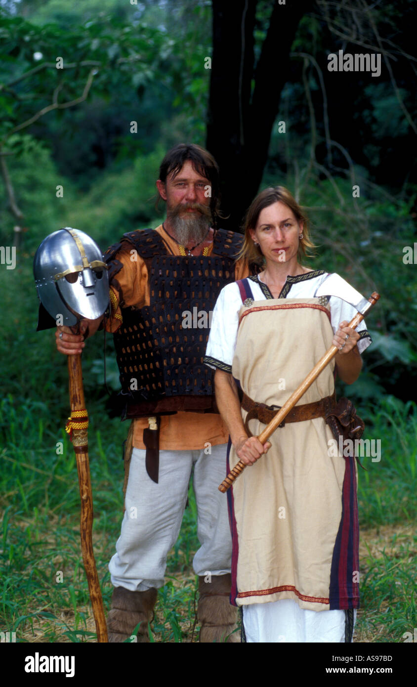 male and female norse warriors recreation society clothes costume shield dress age old ancient Stock Photo