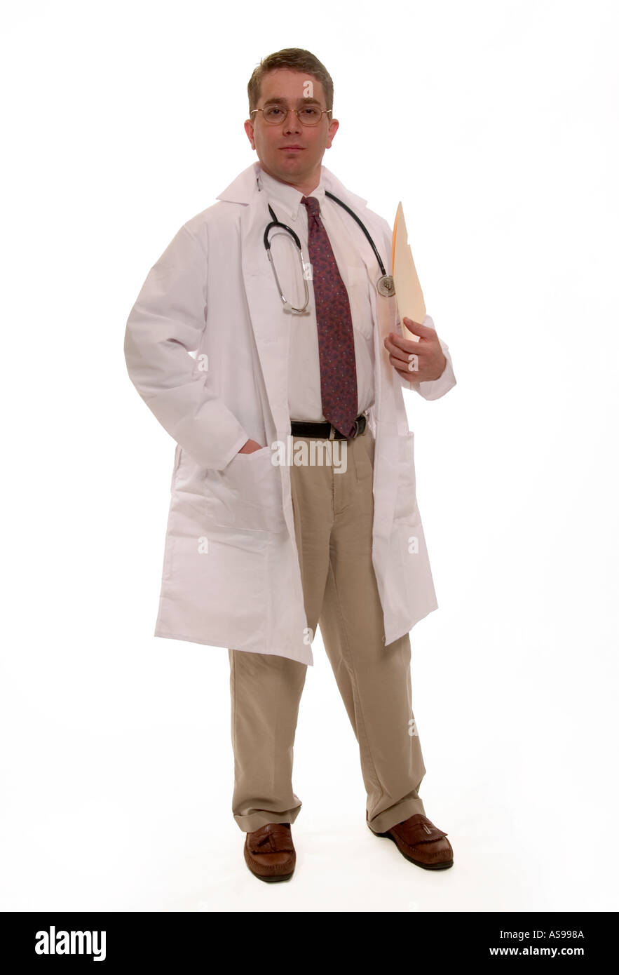 Caucasian male general practitioner in white coat looking up while holding a medical folder, USA. Stock Photo