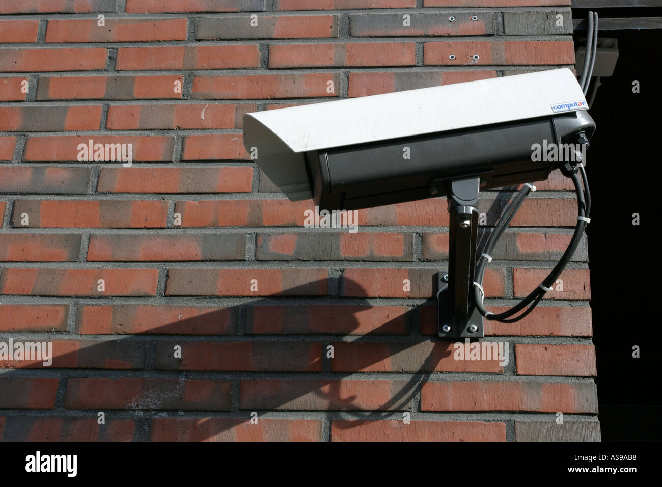 Surveillance camera on building exterior Stock Photo - Alamy