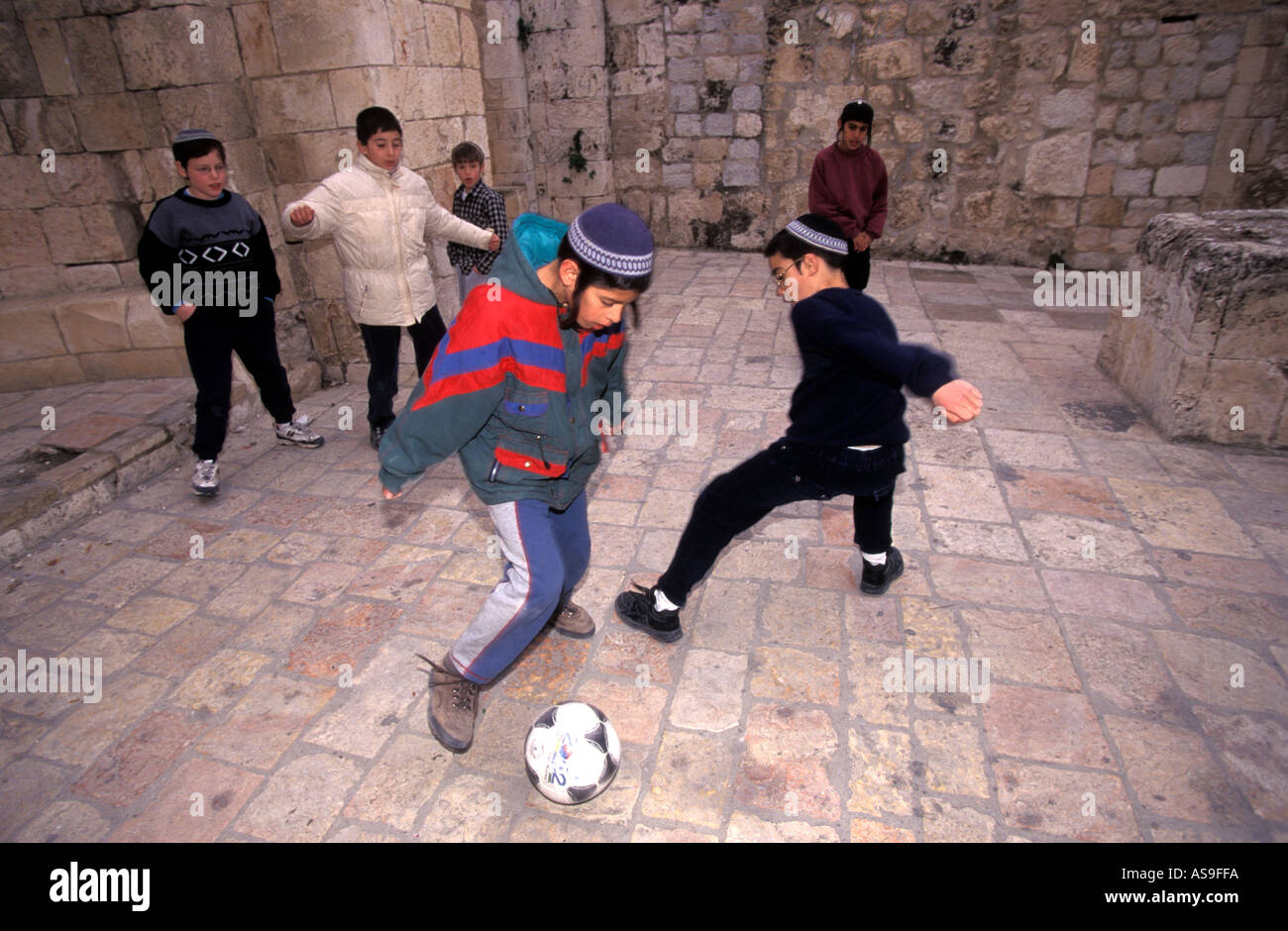 Young Jewish children playing football in the Old City of Jerusalem, Israel Stock Photo Alamy