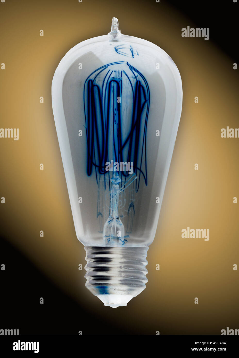 old fashioned Edison style light bulb. The image has been inverted. Stock Photo