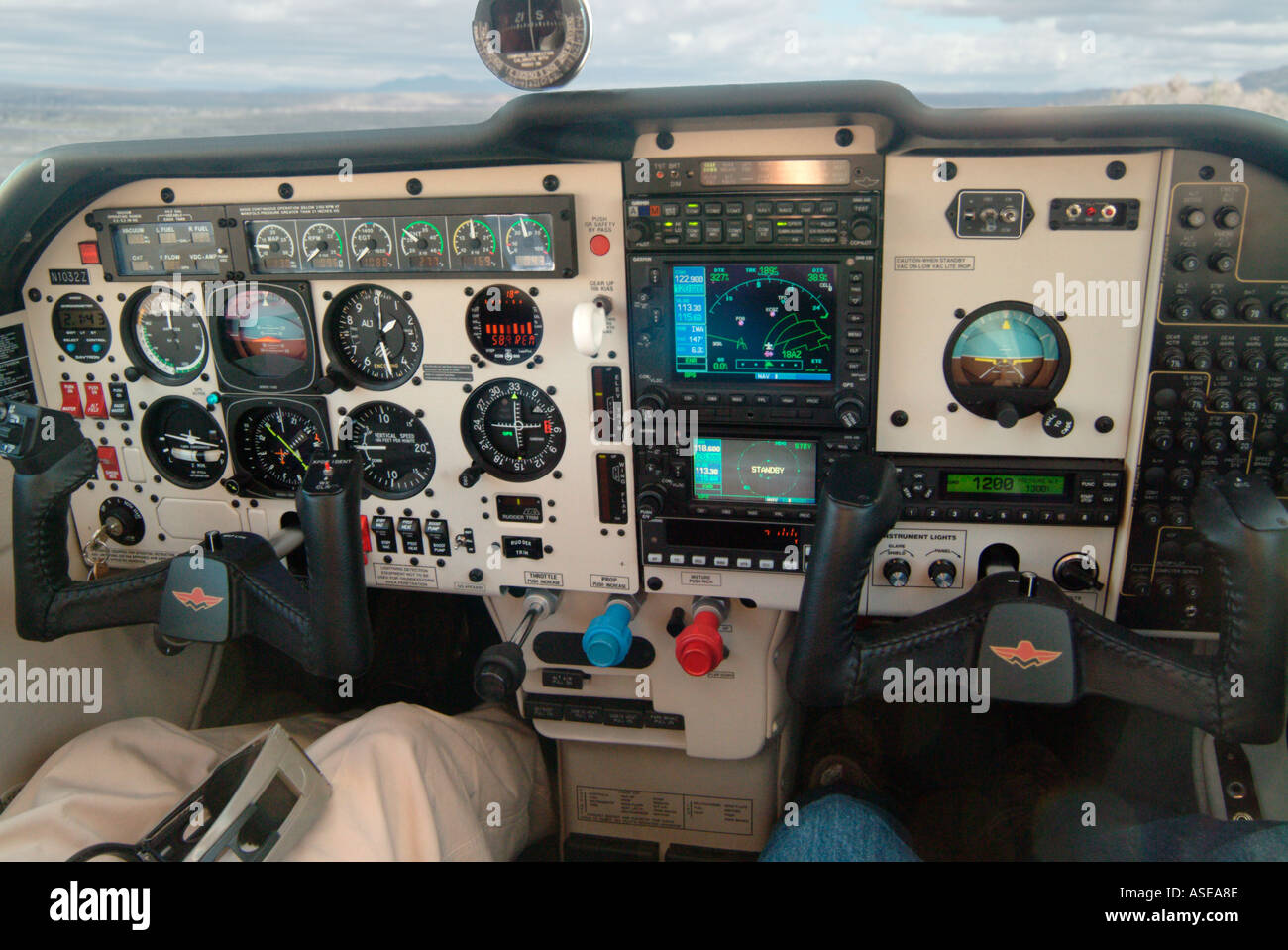 inside a small single engine plane looking at the instruments or dashboard. Stock Photo