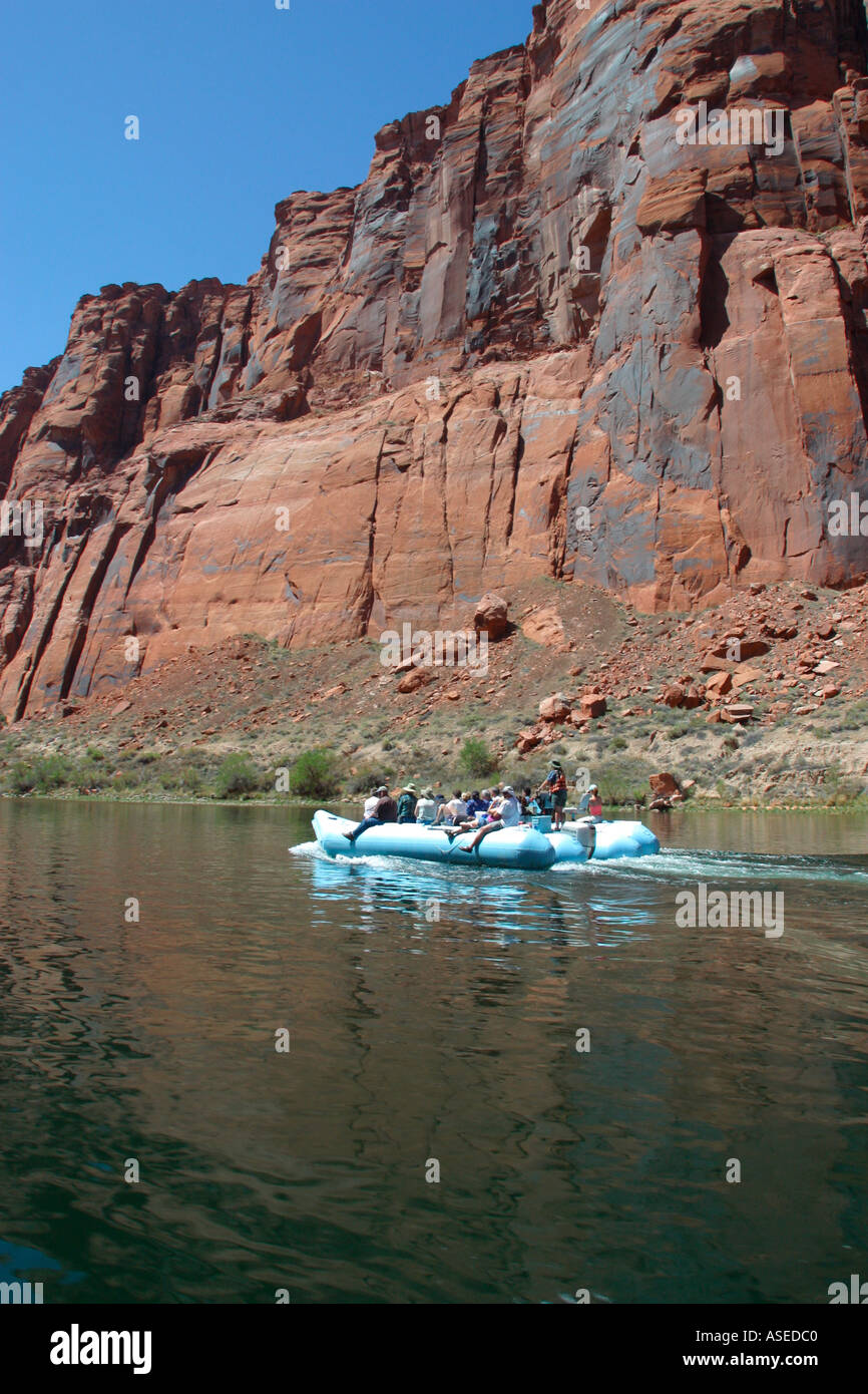 Tourist Floating Down Colorado River below Glen Canyon Dam Page Arizona Stock Photo