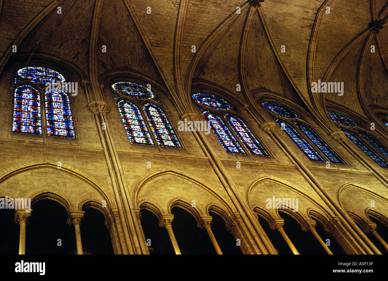 An interior view of Notre Dame Cathedral in Paris FranceThe ceiling of Notre Dame in Paris, France, prior to the devastating April 15, 2019 fire. Stock Photo