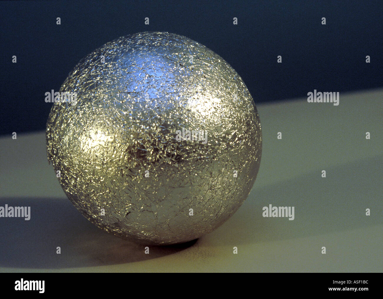 A ball made from tin foil Stock Photo Alamy
