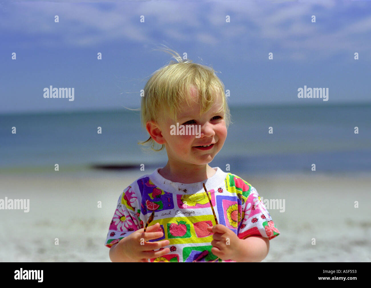 Toddler at the beach Stock Photo