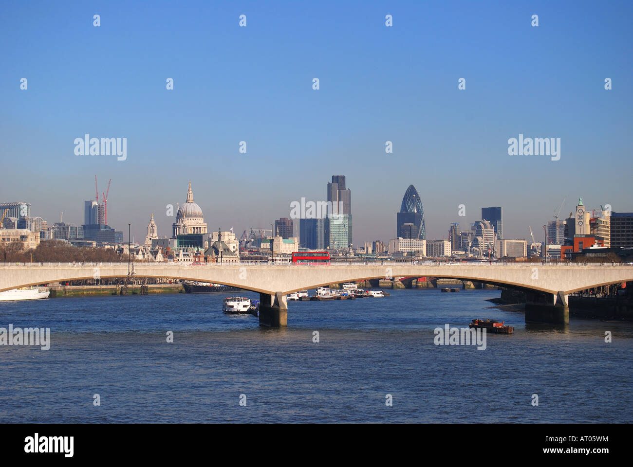 View across River Thames and Waterloo Bridge to City of London Stock Photo