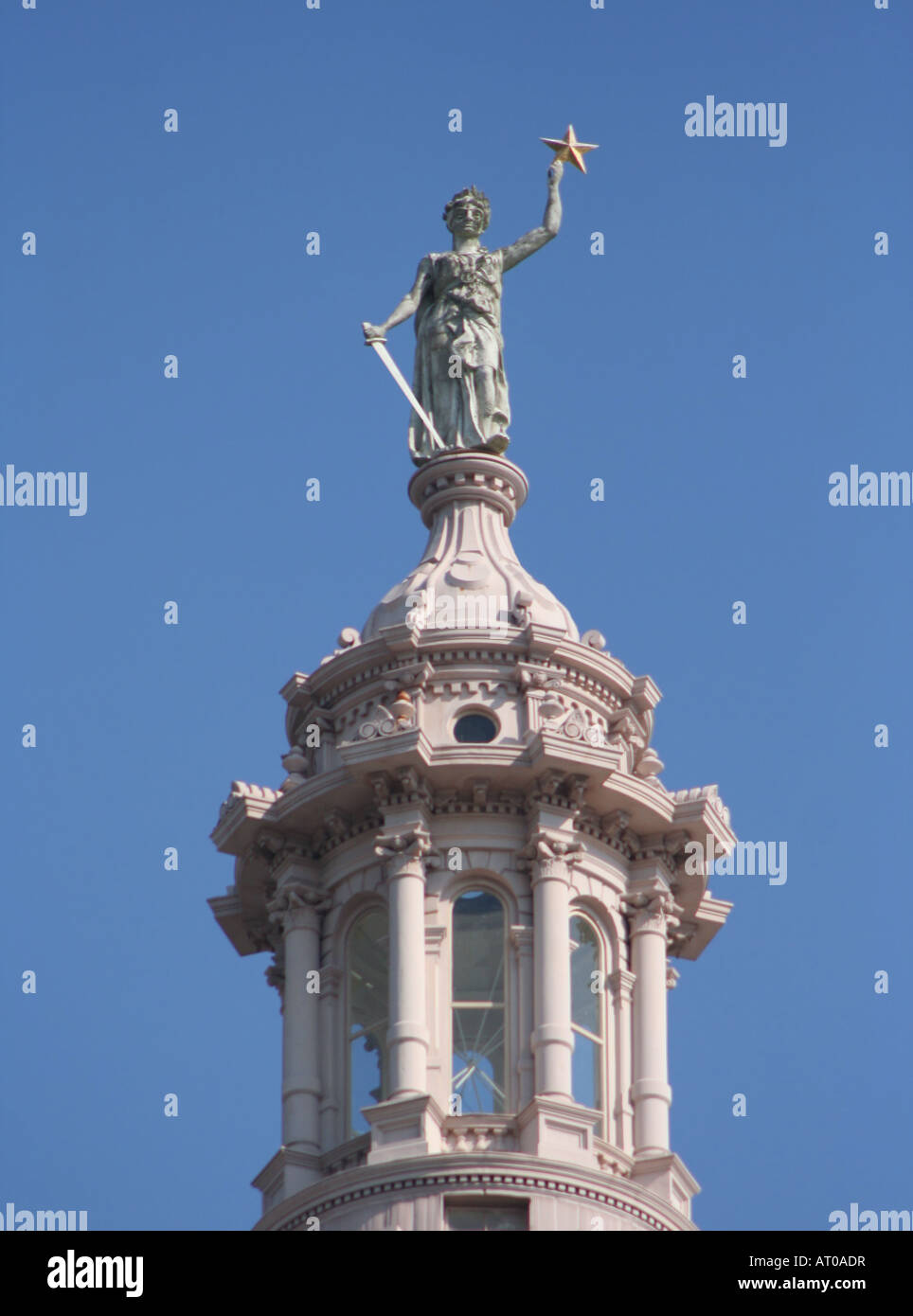 close up of statue on top of Texas State Capitol Building in Austin