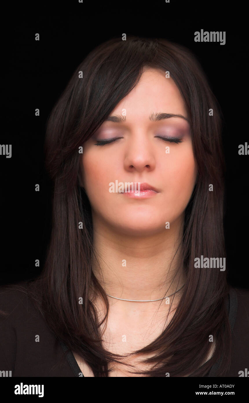 Young woman with eyes closed portrait Stock Photo - Alamy