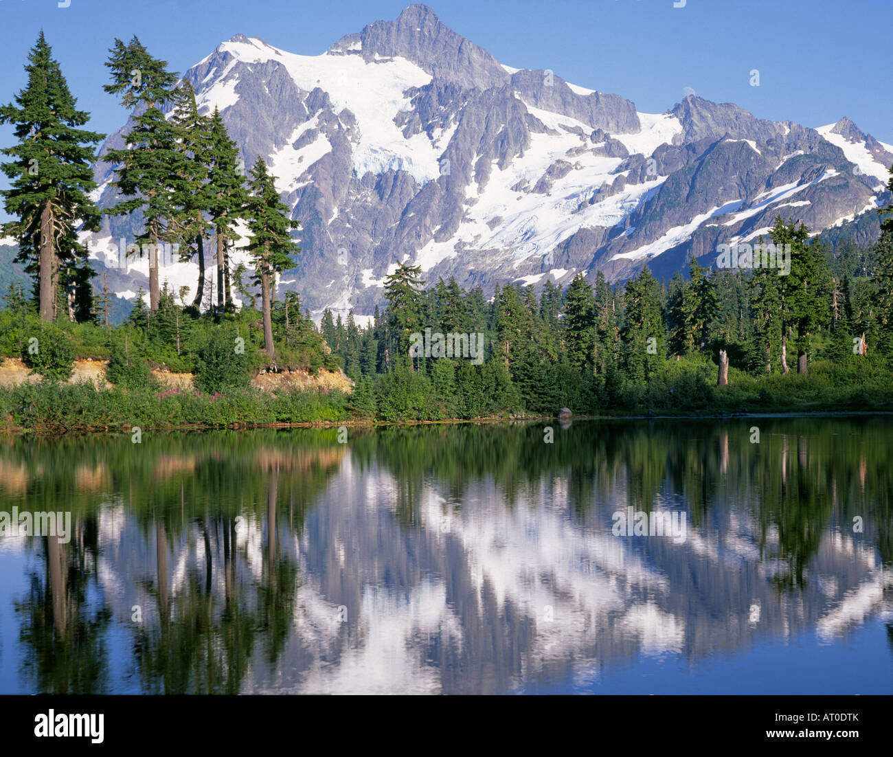 The reflection of Mount Shuksan in Picture Lake in the Cascade Mountains of North Cascades National Park, Washington. Stock Photo